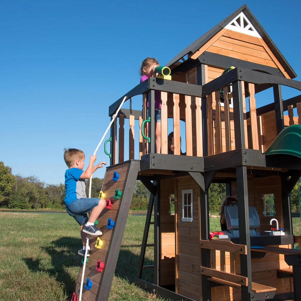 Backyard Discovery Canyon Creek Cedar Wood Swing Set with Wave Slide, Clubhouse, Play Kitchen, Picnic Area, Belt Swings, Web Swing, Rock Wall, Balconies, Playhouse, Step Ladder, Outdoor Playset